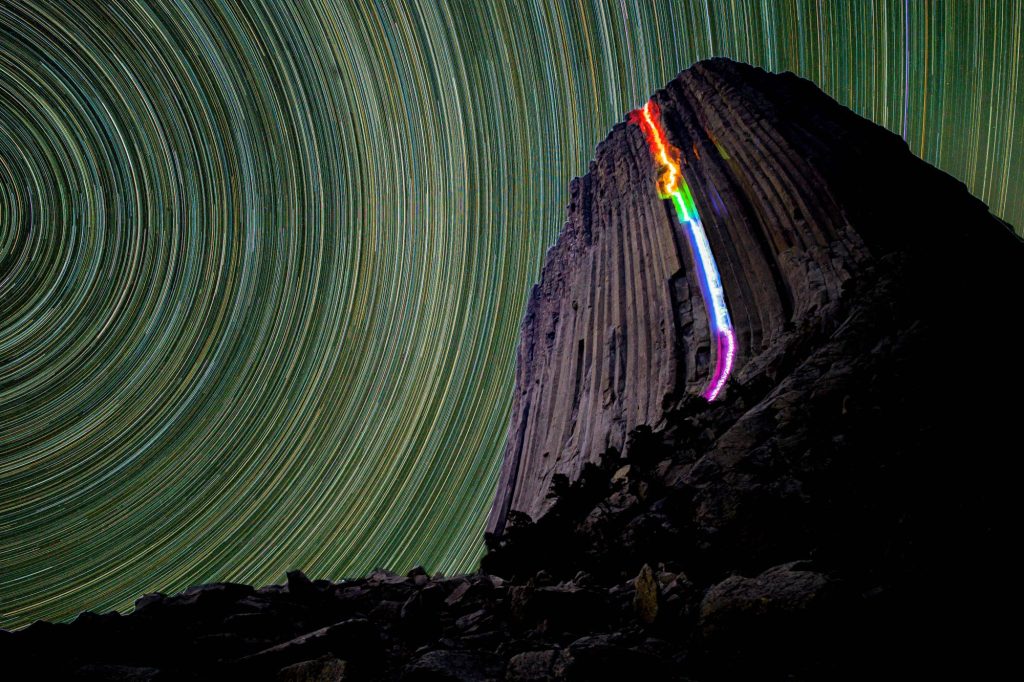Illuminated rock climbing with long exposure by PH Luke